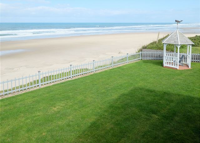 Image Double lot overlooking the beach from a grassy yard with Gazebo