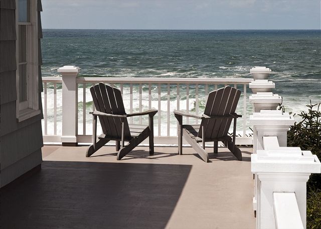 Image Deck view wraps around with 10 wooden chairs