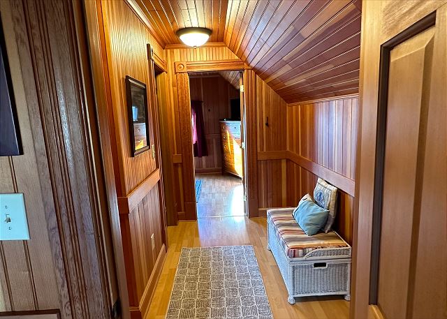 Image Hallway on upper floor opens to bedroom at either end and a bath