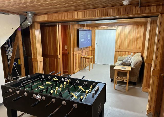 Image Game room with foosball and 65 inch Roku