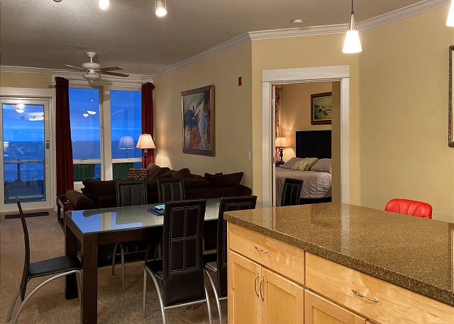 Image Lovely kitchen with island and bar stools