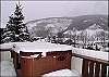 Step into your private hot tub and soak away your ski day!