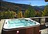 Summer hot tub with wonderful views of the surrounding mountains