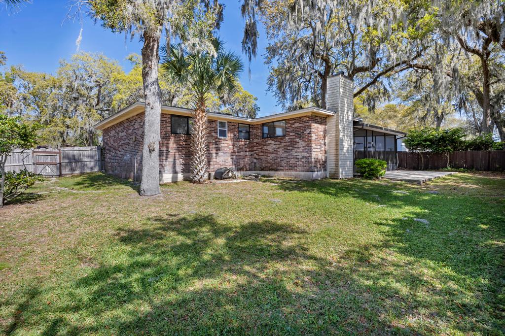 Shady Oaks - Breezy retreat w patio & beach access | Photo 35