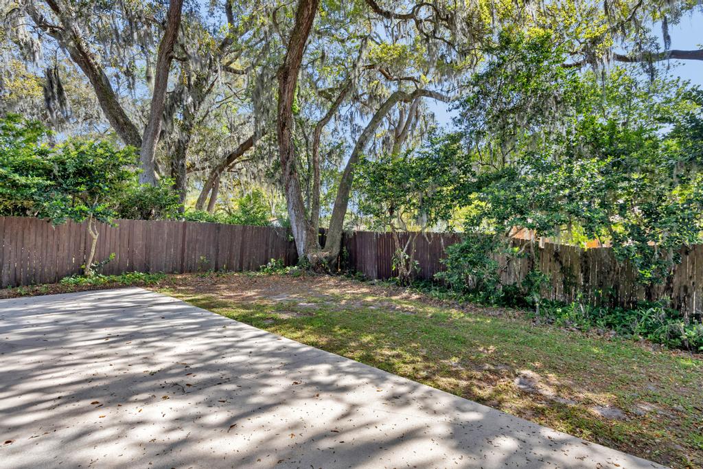 Shady Oaks - Breezy retreat w patio & beach access | Photo 32