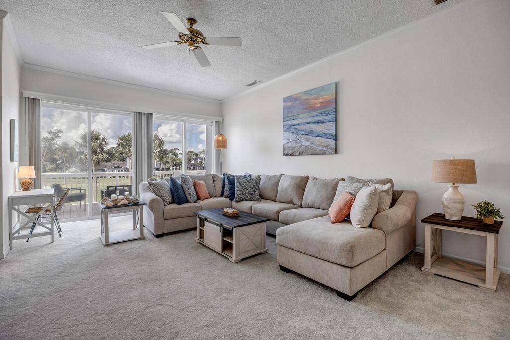 Fairway Breeze - Coastal retreat w/ pool access | Photo 12