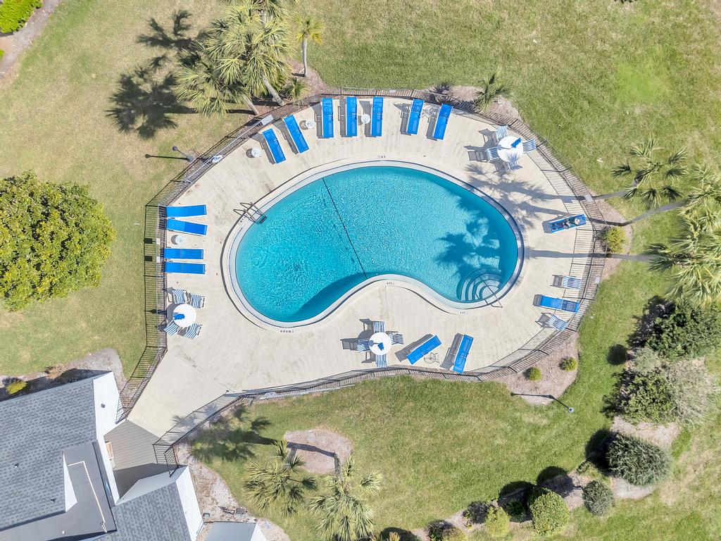 Fairway Breeze - Coastal retreat w/ pool access | Photo 6