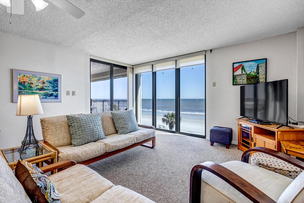 Crescent Breeze - Oceanfront condo w/ lanai & pool | Photo 1