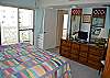 This bedroom has its own sliding glass door to the beach front balcony.