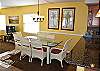 Large comfortable dining room, table, and chairs, just perfect for the six of you.