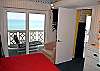 Master bedroom with sliding glass doors that lead directly to your balcony and the view beyond.