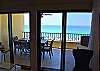 View from just inside the living room glass doors to the huge 30' beach front balcony.