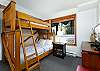 Bunk bed, single on top and double below with TV