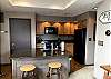 The kitchen is open to the living room and the eating area. It is a fully equipped kitchen. There is a Keurig coffee machine for those who like their coffee.