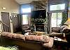 The living room is a cozy place to relax after a day exploring the Laurel Highlands. In the spring or fall, turn the gas fireplace on to take the chill out of the air. The living room is an open floor plan to the kitchen.