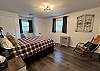 The third bedroom features a full-size bed with a twin trundle pull out, and two closets.
