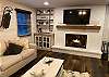 The gas fireplace provides a warm and cozy atmosphere.