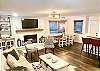 The living area provides plenty of seating for guests.
