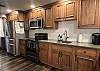 The kitchen is stocked with cooking/baking essentials for guests to enjoy during their stay.
