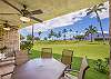 Large table and chairs on private view deck facing ocean