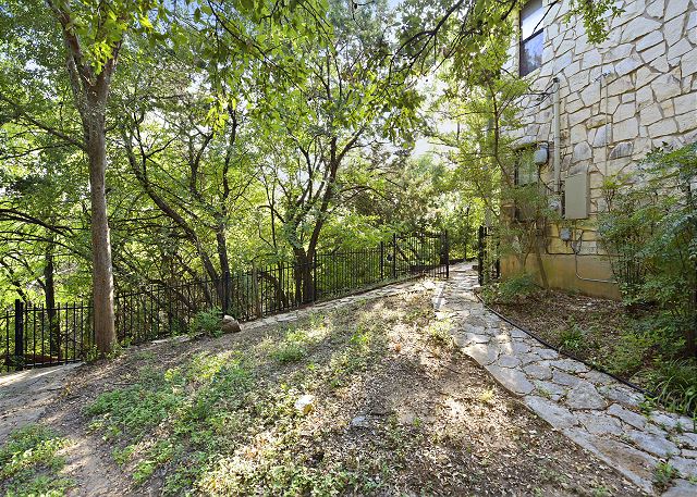 Back yard leading down to the creek and woods