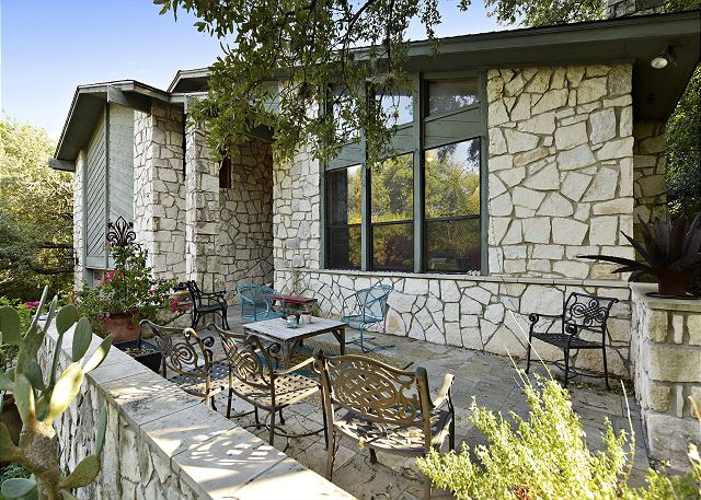 Front porch where you can enjoy your family/friends company while the kids play basketball or games in the front yard