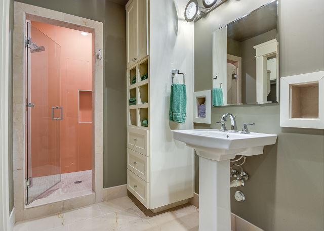 Full bathroom attached to the Guest Suite King Bedroom on the lower level