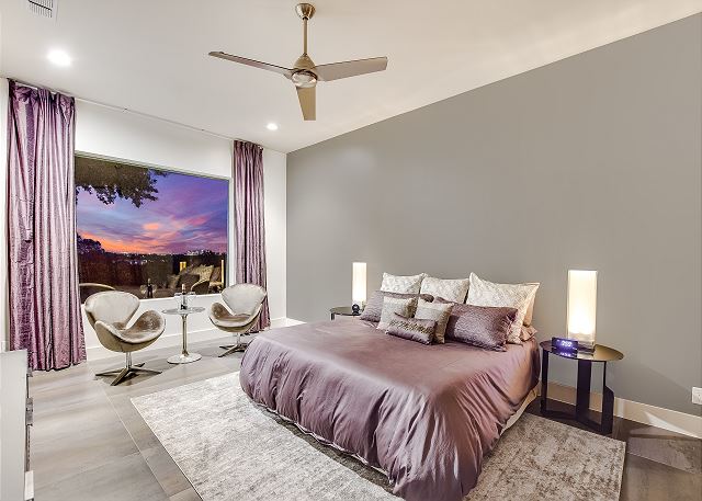 Enjoy the trademark Skyline View from this second story Master Bedroom.