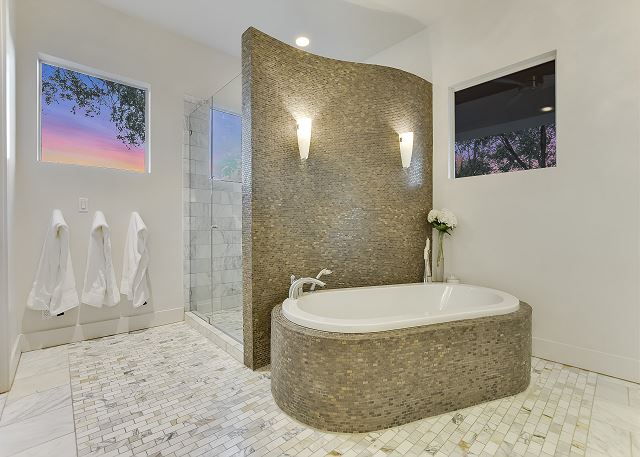 Take your pick between a spacious shower or inviting bath tub.