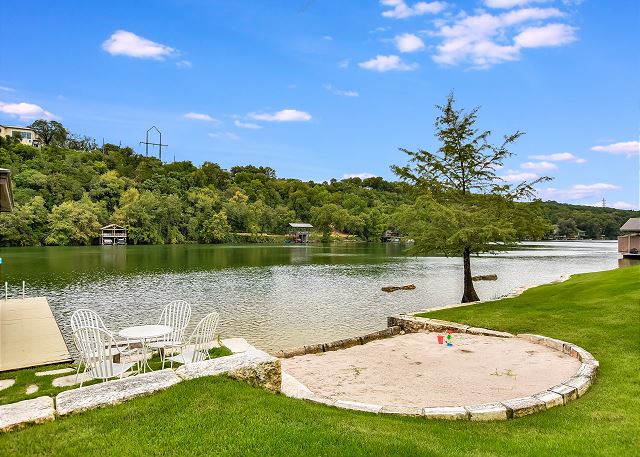 The sand beach next to the boat dock