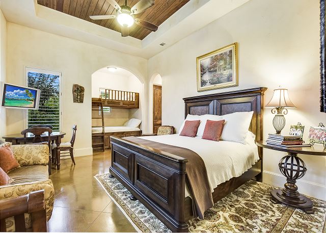 Casita bedroom can sleep two in the King bed and then an additional two in the bunk beds