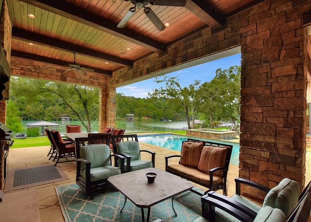 The outdoor living area is the perfect place to enjoy the company of your group while swimming in the pool or lake, playing soccer, basketball, or sand volleyball