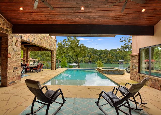 Another angle of the patio area with a view of the pool
