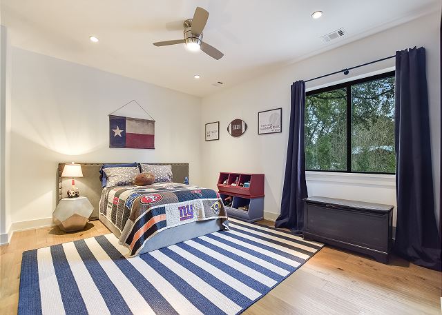 Enjoy this queen room with lots of space.