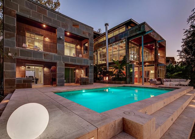 This wonderful pool and backyard has endless possibilities. You can play pool volleyball, corn hole in the yard, or just lounge by the pool and BBQ!