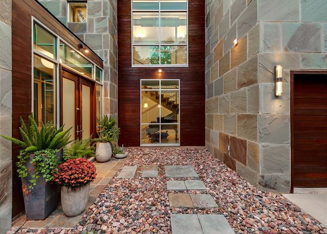 The front walkway that leads up to the door.