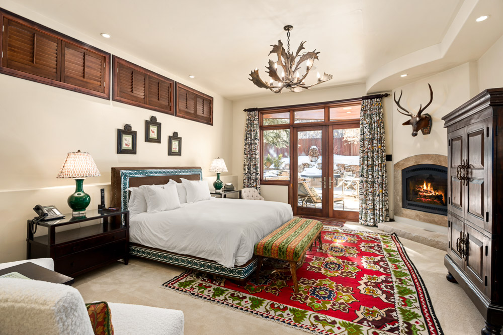 Primary Bedroom with fireplace and seating area. 