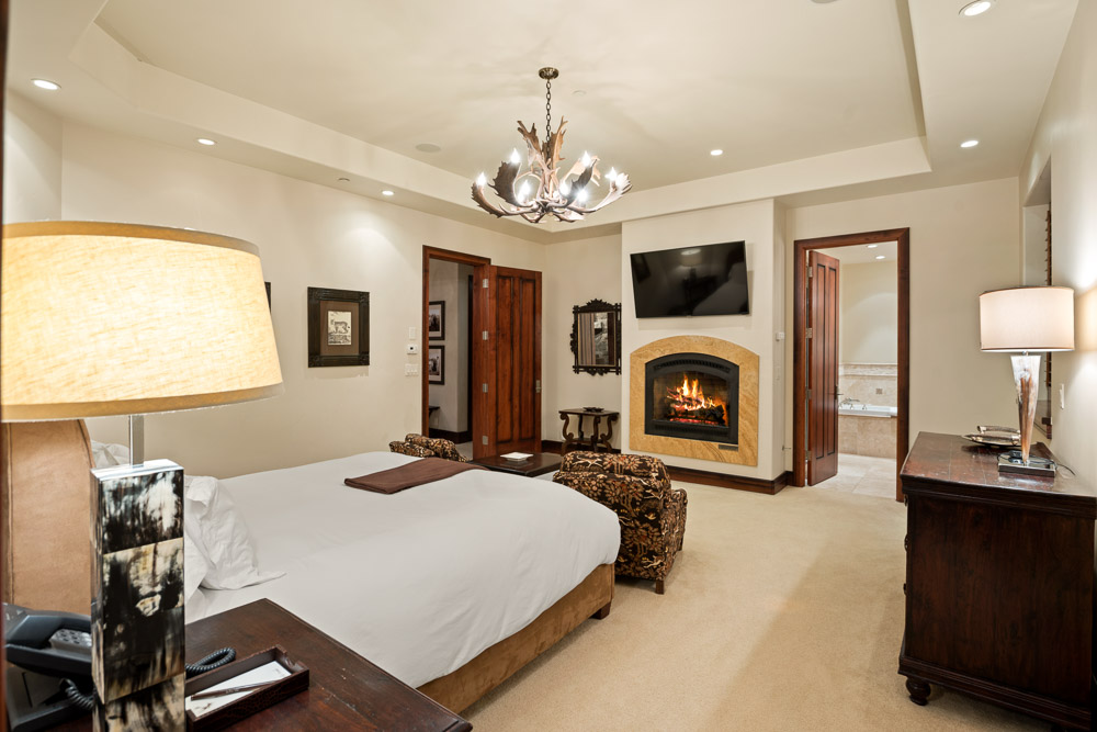 Guest Suite with Fireplace and seating. 