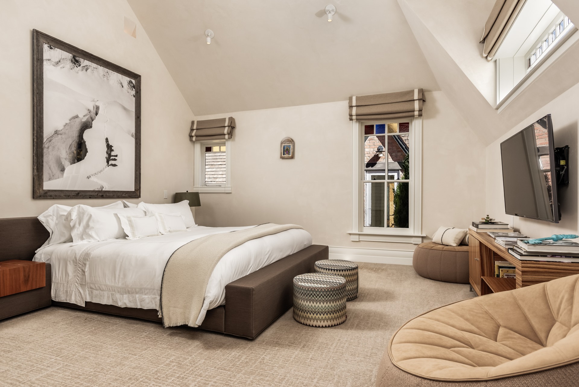 Master Bedroom with TV and Seating. 