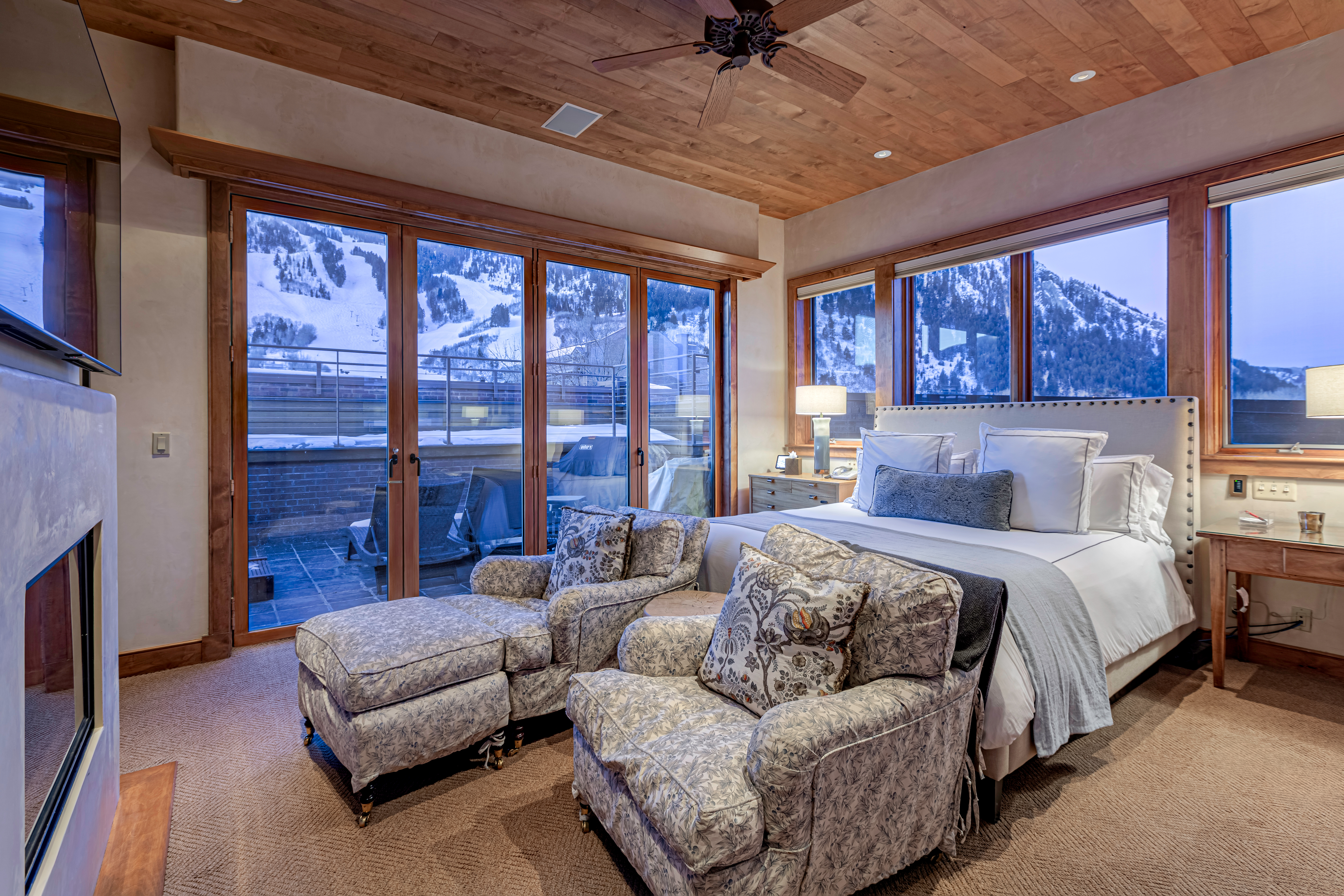 Master Bedroom with wrap-around views of Aspen Mountain. 