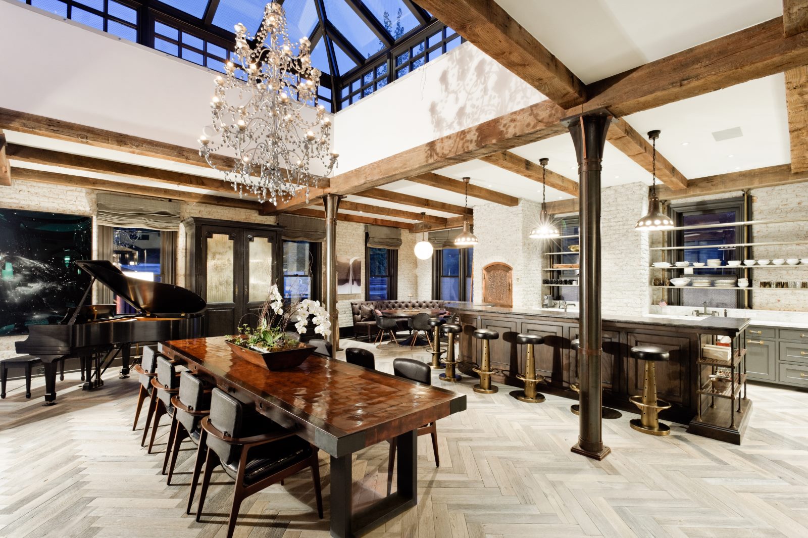 Dining Room area with a Grand Piano and stunning chandelier. 