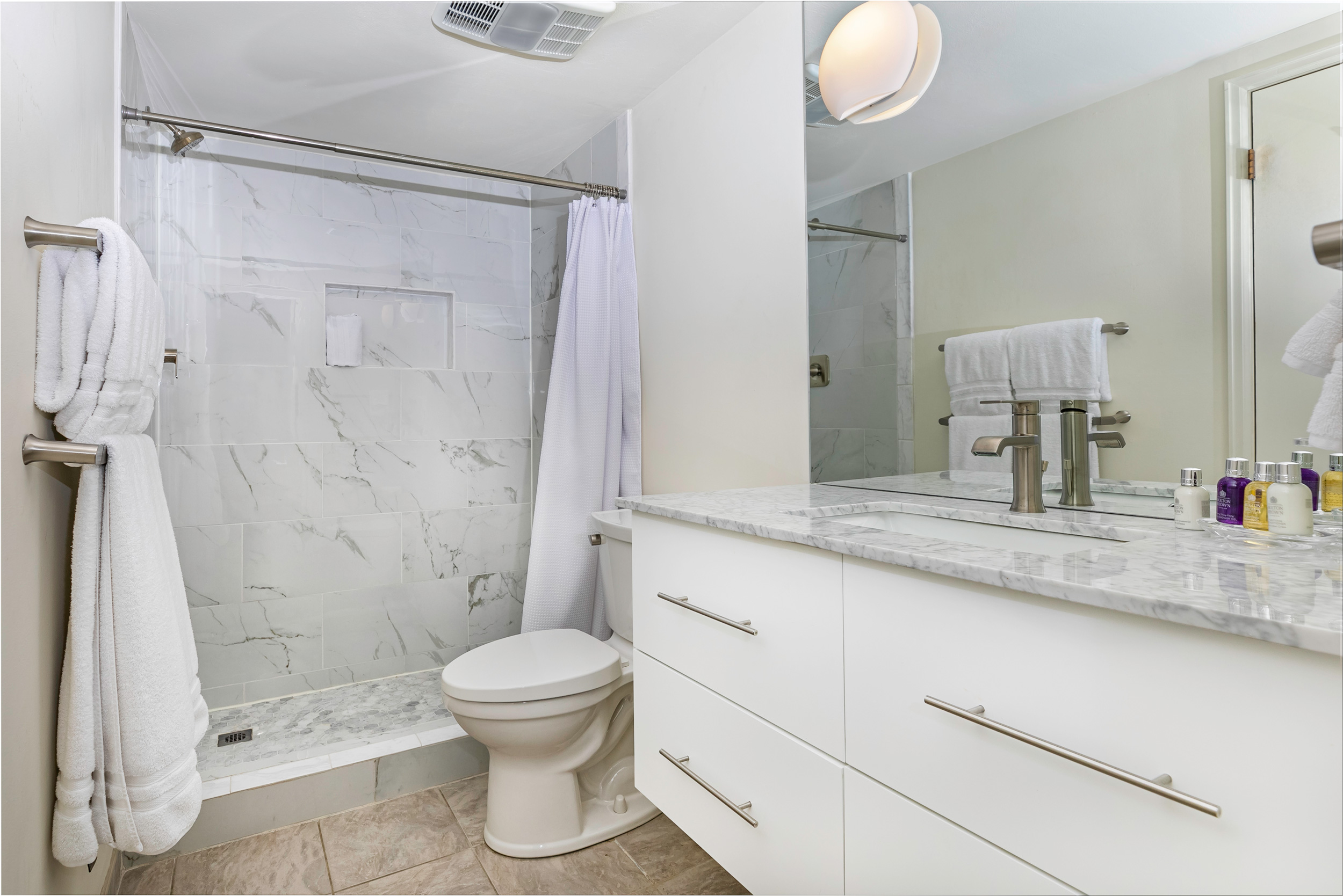 Lower Level Guest Bathroom with walk-in shower. 