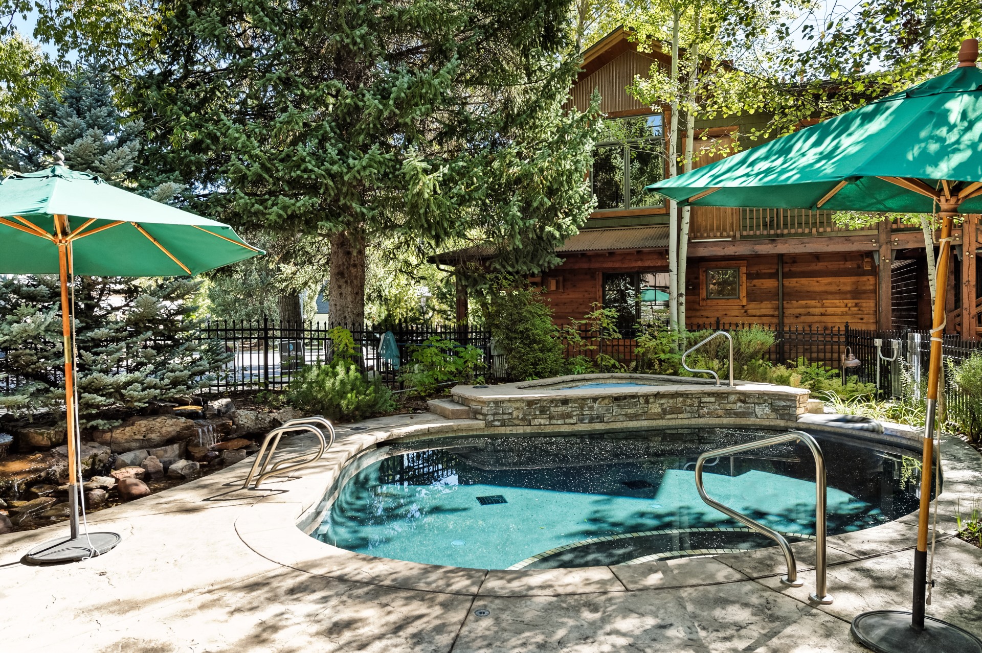 Complex features a pool and hot tub for guest use. 