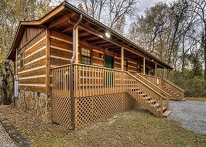 Amazing Riverside log home with two kitchens, master suites, hot tub, & Game!