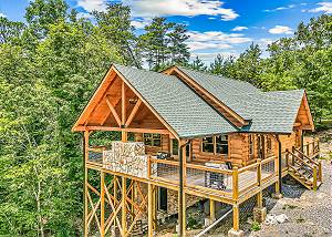 Brand New Smoky Mountain Log Cabin with a theater room and outdoor Fire Pit!