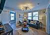 Sit back and relax in the upstairs living room and enjoy some complimentary snacks