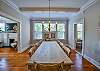 The dining room is connected to the living room.