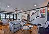The living room has plenty of space for everyone in your party to enjoy.