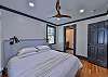 The bedroom has an attached bathroom.