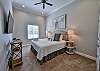 The first bedroom has a king bed and smart tv.